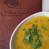 Tadka Dal · Traditional north Indian style yellow lentil tempered with onion, ginger, garlic, and specia...