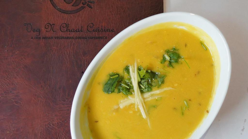 Toor Ki Dal · Yellow lentil soup cooked with curry leaves, dry whole red chilies in traditional Indian spices.