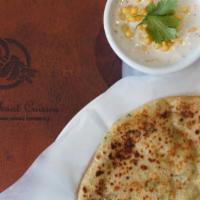 Gobi Paratha · Cauliflower minced with special spices stuffed in whole wheat flour.