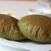 Spinach Poori (2) · Puffed deep fried whole wheat bread with spinach.
