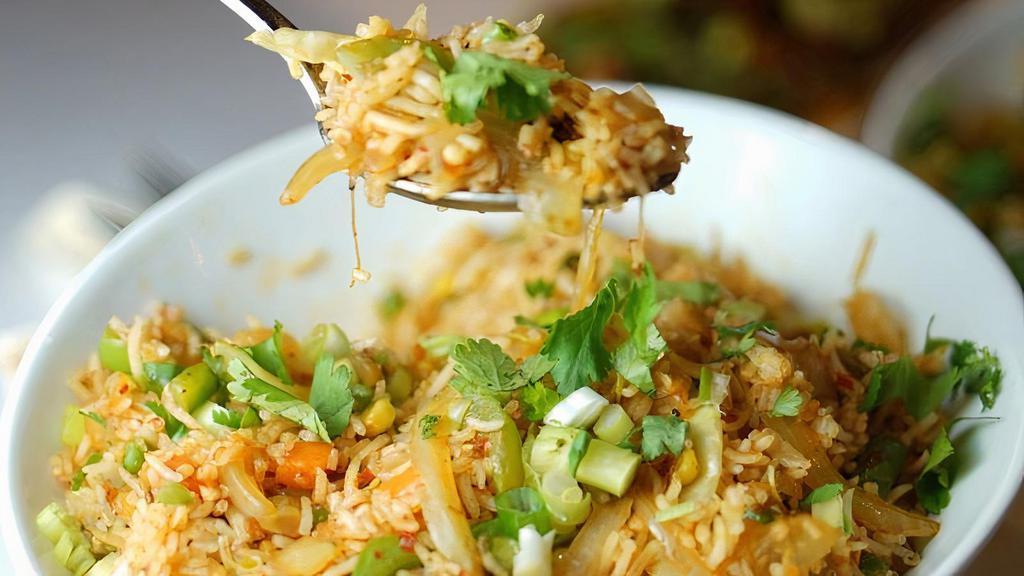Fried Rice · The classical basmati rice tossed with assortment green vegetables.