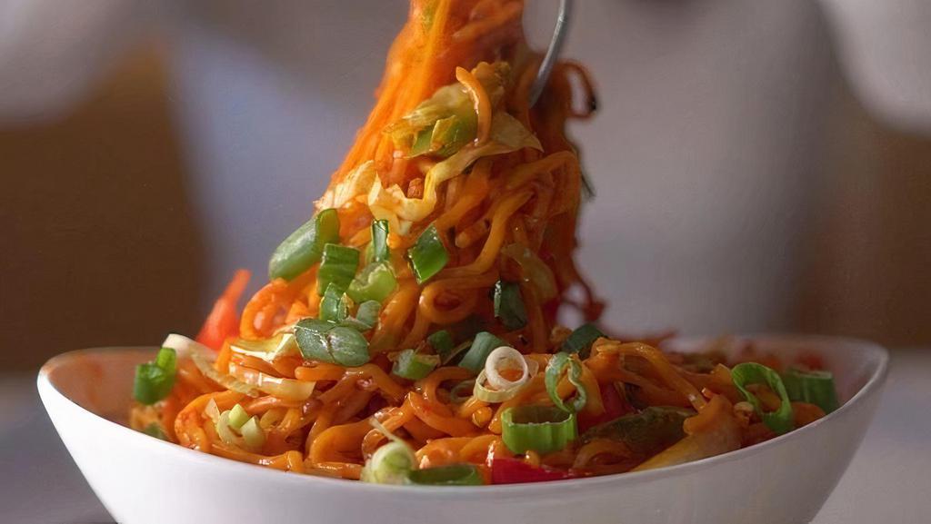 Schezwan Noodle · Noodles tossed with an assortment of shredded vegetables and chef special schezwan sauce.