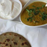 Zunka Bhakar · Flatbreads made from millet flour served with cooked gram flour curry, authentic Marathi spi...