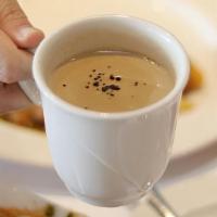 Indian Coffee · Indian style steamed milk coffee.