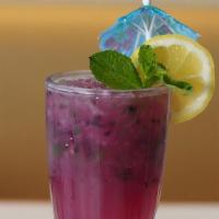 Blueberry Mojito · Fresh mint, lime wedge, sugar syrup, and blueberry.