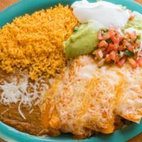 Enchiladas · Soft corn tortilla filled with meat topped green or red sauce and cheese.