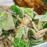 César Salad With Chicken · Romaine, parmesan, anchovy, croutons with chicken.