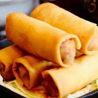 Crispy Rolls · Crispy wrappers stuffed with cabbage, carrot, onions, silver noodles, served with plum sauce...