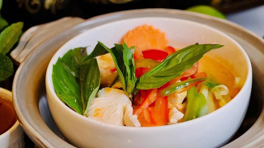 Red Curry - Vegetarian · Bamboo shoots, carrots, red-green bells & basil (Med Hot)