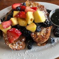 French Toast · brioche, mixed berries, powder sugar and maple syrup.