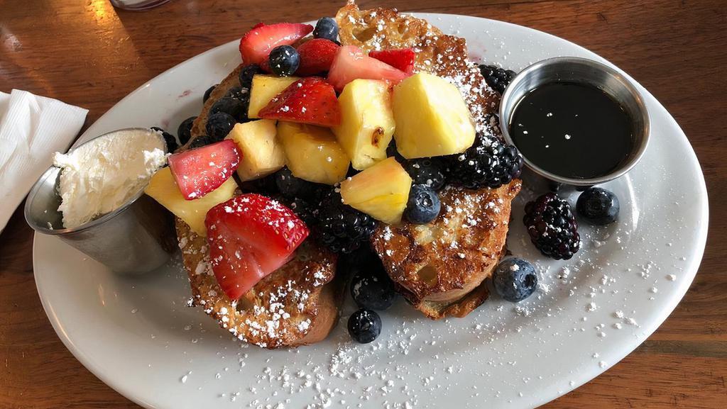 French Toast · brioche, mixed berries, powder sugar and maple syrup.