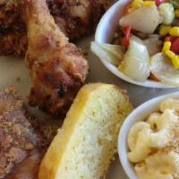 Fried Chicken Plate · two pieces of fried chicken, comes with two side of your choice. Add chicken for an addition...
