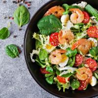 Shrimp Salad · Fresh caught shrimp, artichoke hearts, and tomatoes, served over a bed of lettuce with choic...