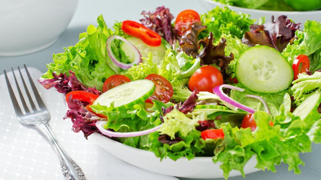 Chef's Salad · Salami, pepperoncini, tomato, and cheese, served over a bed of lettuce with choice of dressing.