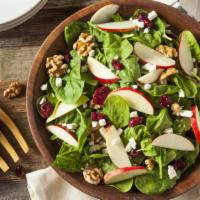 The Walnut Gorgonzola Salad · Seasonal greens, baby arugula, tomatoes, walnuts, gorgonzola, parmigiano cheese, and balsami...
