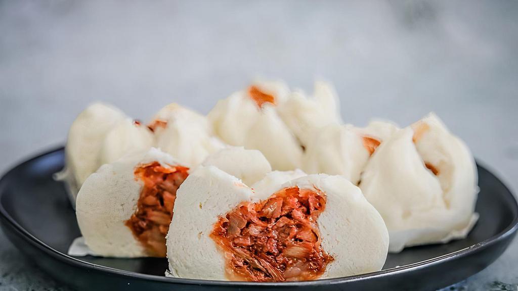 BBQ Pork Bao  · Soft, fluffy, and smooth Vietnamese steamed buns filled with delicious savory pork filling.