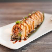 Lion King Roll · Baked crab meat avocado, fresh salmon, topped with sesame seed green onion, spicy mayo and u...