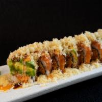Mango Crunch Roll · Spicy crab meat, mango, topped with salmon, avocado, spicy mayo, unagi sauce and crunch.