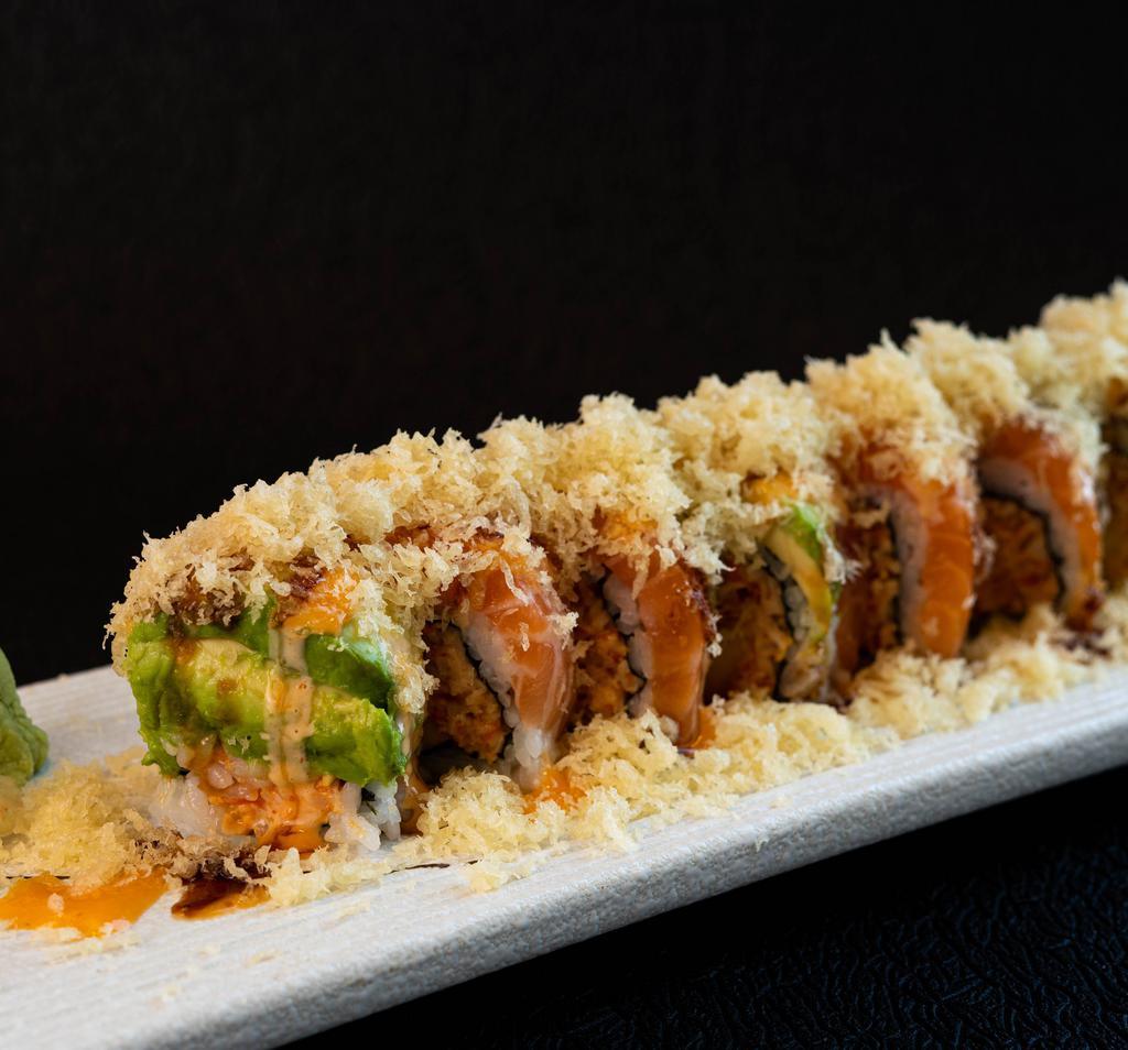 Mango Crunch Roll · Spicy crab meat, mango, topped with salmon, avocado, spicy mayo, unagi sauce and crunch.