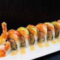 Spicy Geisha Roll · Shrimp tempura, crab meat, cucumber, topped with spicy crab meat, ebi avocado and yuzu miso ...