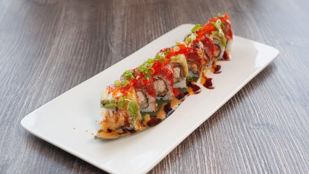 Naked Fish Roll · Deep-fried assorted fish cucumber, topped with spicy tuna, avocado, tobiko, green onion, spicy mayo and unagi sauce.