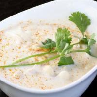 TOM KHA NOODLE · Spicy & sour coconut milk soup, chili, lemongrass, kaffir lime, cilantro, green onion.