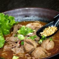 THAI BOAT NOODLE · Sliced beef, meat balls, fried garlic, bean sprout, cilantro, onion in beef broth.
