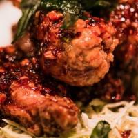 Angel Wing · Fried chicken wings marinated in spicy sweet and sour basil sauce.