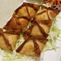Crab Moon Cheese · Imitation crab meat, cream cheese, green onion stuffed, and fried in thin wonton skin. Serve...