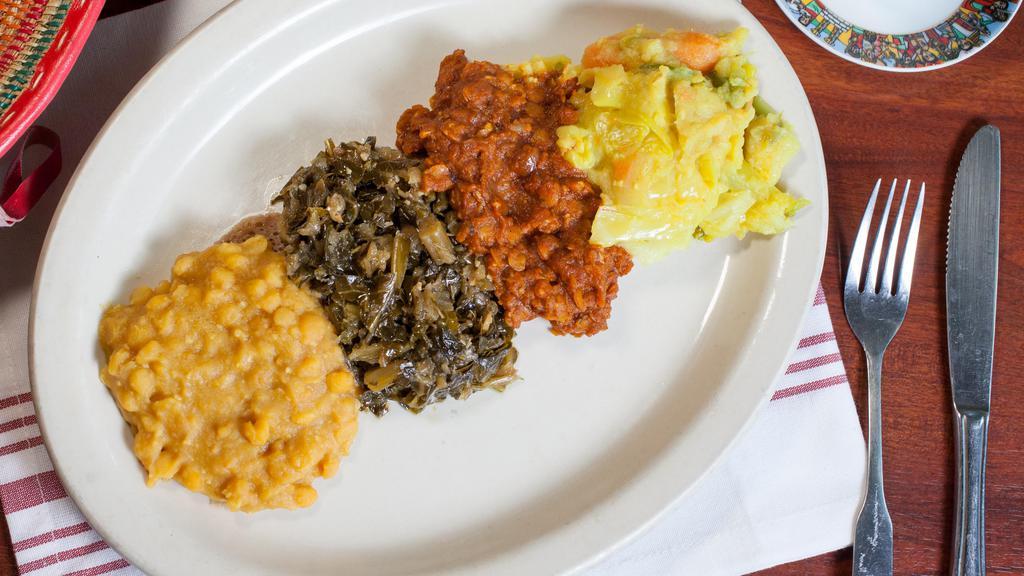 Veggie Sampler · Spicy lentil stew, yellow pea stew, collard greens, potatoes, carrots, green beans, and cabbage.