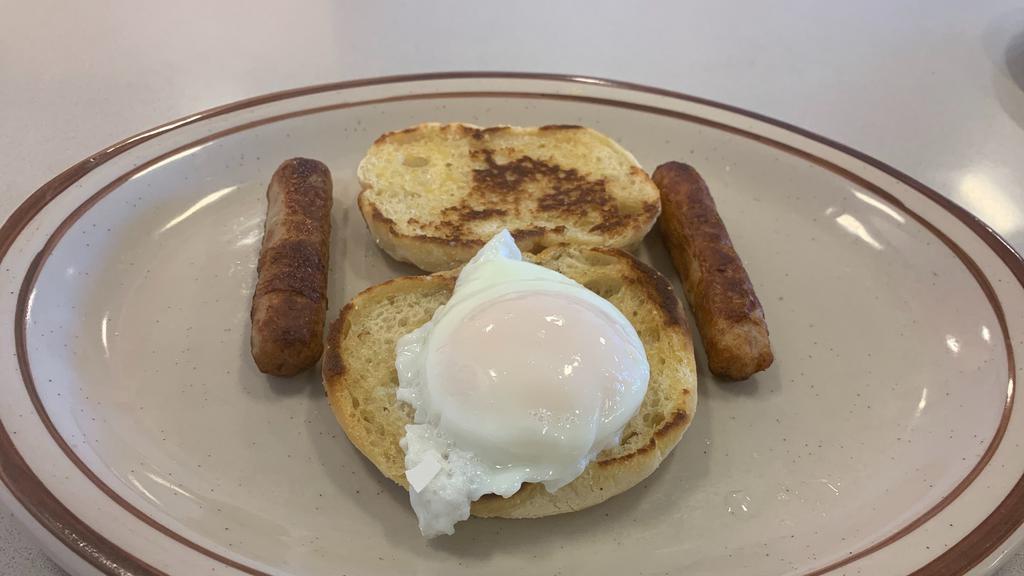 3. Min · One poached eggs English muffin, and a choice of two bacon strips or two sausage links.