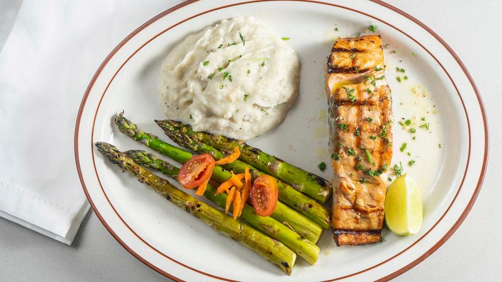 Salmon (8 oz) · 8  o z of grilled wild Alaskan fillet, served with grilled asparagus and mashed potatoes.