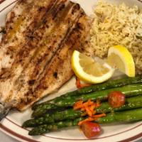 Trout · 8 o z Boneless grilled trout served with asparagus  and rice.