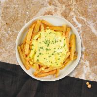 Cheese Fries · Crispy golden fresh made french fries smothered in creamy cheese.