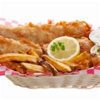 Fried Fish Basket with Tartar Sauce · Hot & Tasty Cajun fish, seasoned and fried to perfection. Served on a bed of fries, with a s...