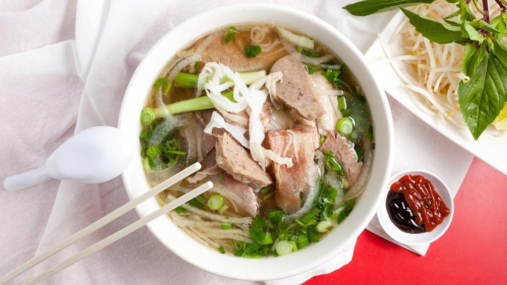 Combo Pho - Pho Dac Biet (Large) · With eye-round steak flank, beef balls, brisket, soft tendon and tripe.