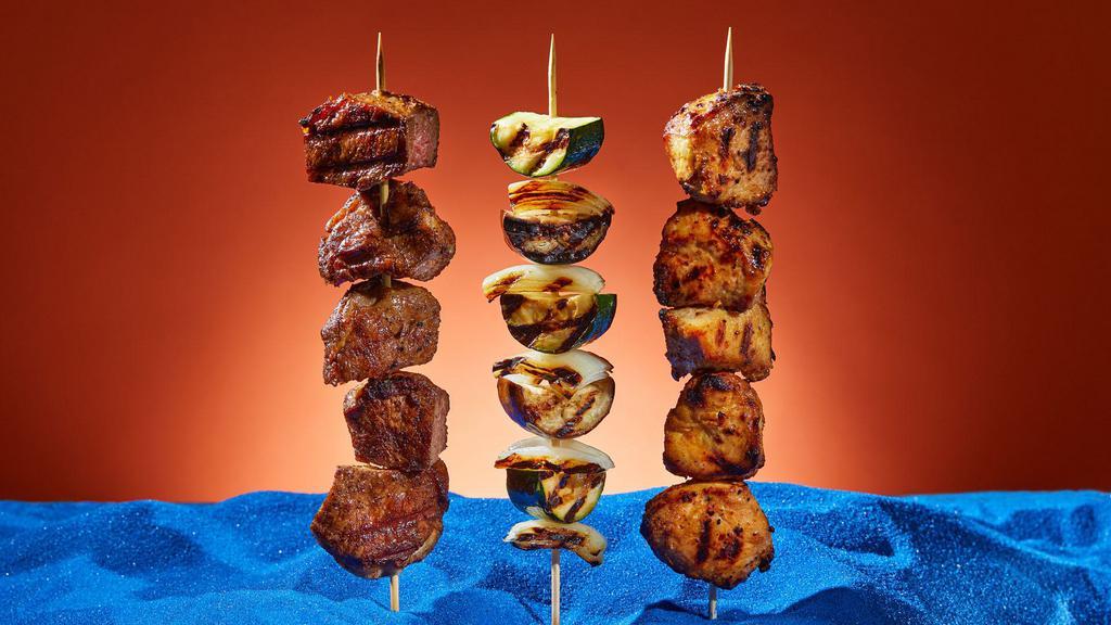 Kebab Trio · Your choice of three kebabs.