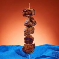 Lamb Kebab (1pc) · Marinated cubes of lamb grilled on a skewer.