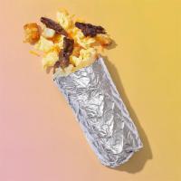 Authentic Af · Tender carne asada, scrambled eggs, melted cheese, crispy tater tots, wrapped in a flour tor...