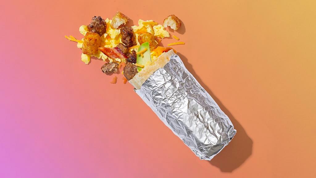 One Of A Kind · Scrambled eggs, melted cheese, crispy tater tots, wrapped in a flour tortilla. Choose your add ons and sauces to make the breakfast burrito of your dreams.