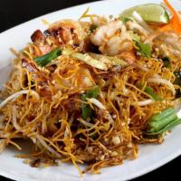 Crispy Pad Thai · Crispy egg noodles wok fried with eggs, bean sprouts, green onions, and ground peanuts.