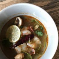 Tom Yum Noodle Soup · Lemongrass spicy hot and sour soup with beansprout, green onions and cilantros.