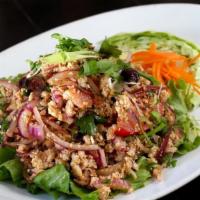 Larb · Spice level 2. Choice of minced chicken, beef or pork mixed with Thai chili, lemongrass, oni...