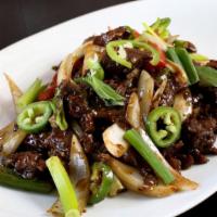 Krua's Zesty Beef · Spice level 3. Marinated sliced beef lightly sautéed with onions, mushrooms, red bell pepper...