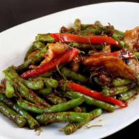 Hot String Beans · Spice level 2. String beans, red bell peppers and basil leaves sautéed in spicy roasted chil...
