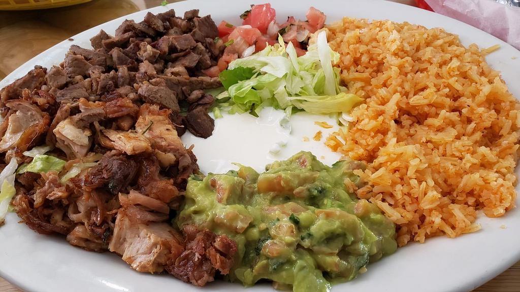 Carne Asada Plate · Chopped grilled steak.With rice refried beans lettuce salsa guacamole sour cream and corn tortillas one of the best sellers