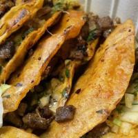 Carne Asada Taco · Chopped grilled steak.or your choice of meats traditional style onion cilantro hot sauce or ...