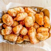 GARLIC CHEESE CURDS · Deep fried Wisconsin cheese, garlic…don’t ask questions, you know you want some!