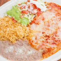 Enchiladas Platter (3) · Three corn tortilla enchiladas accompanied with Refried Beans, Rice, Lettuce, Tomatoes, Sour...