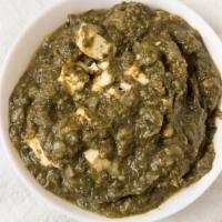 Saag Paneer · Homemade Cottage cheese cubes cooked with fresh spinach leaves with a little yogurt, ginger,...